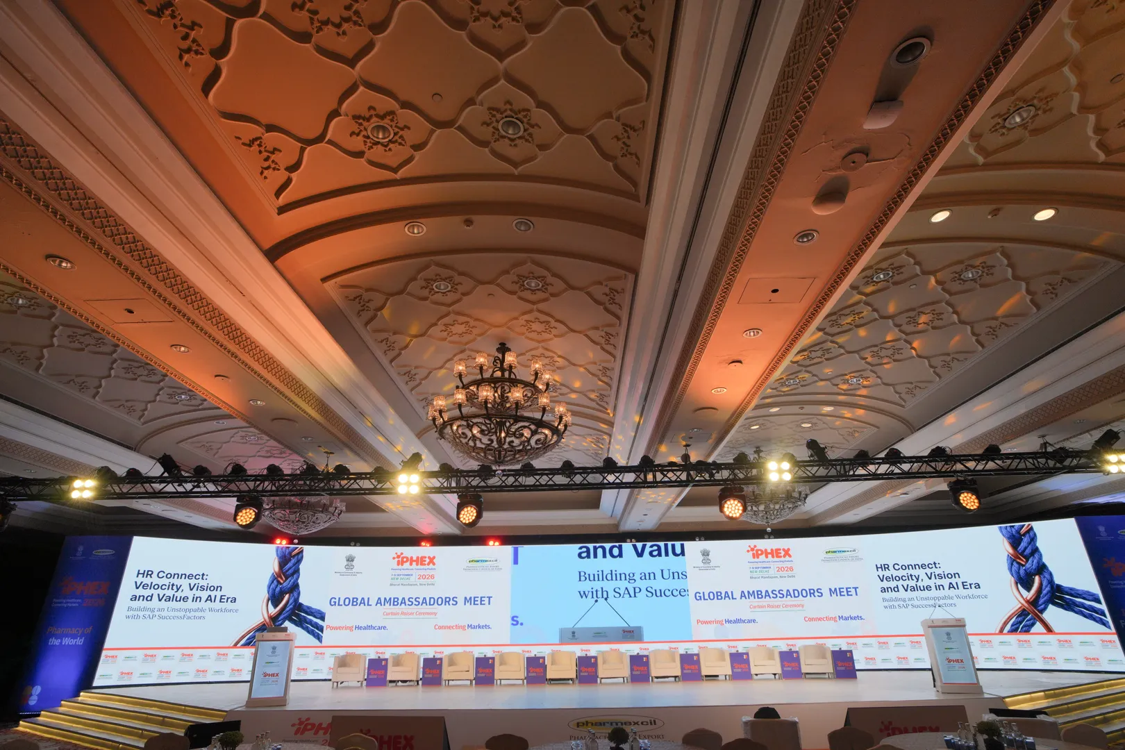 Corporate conference stage and seating at a large venue